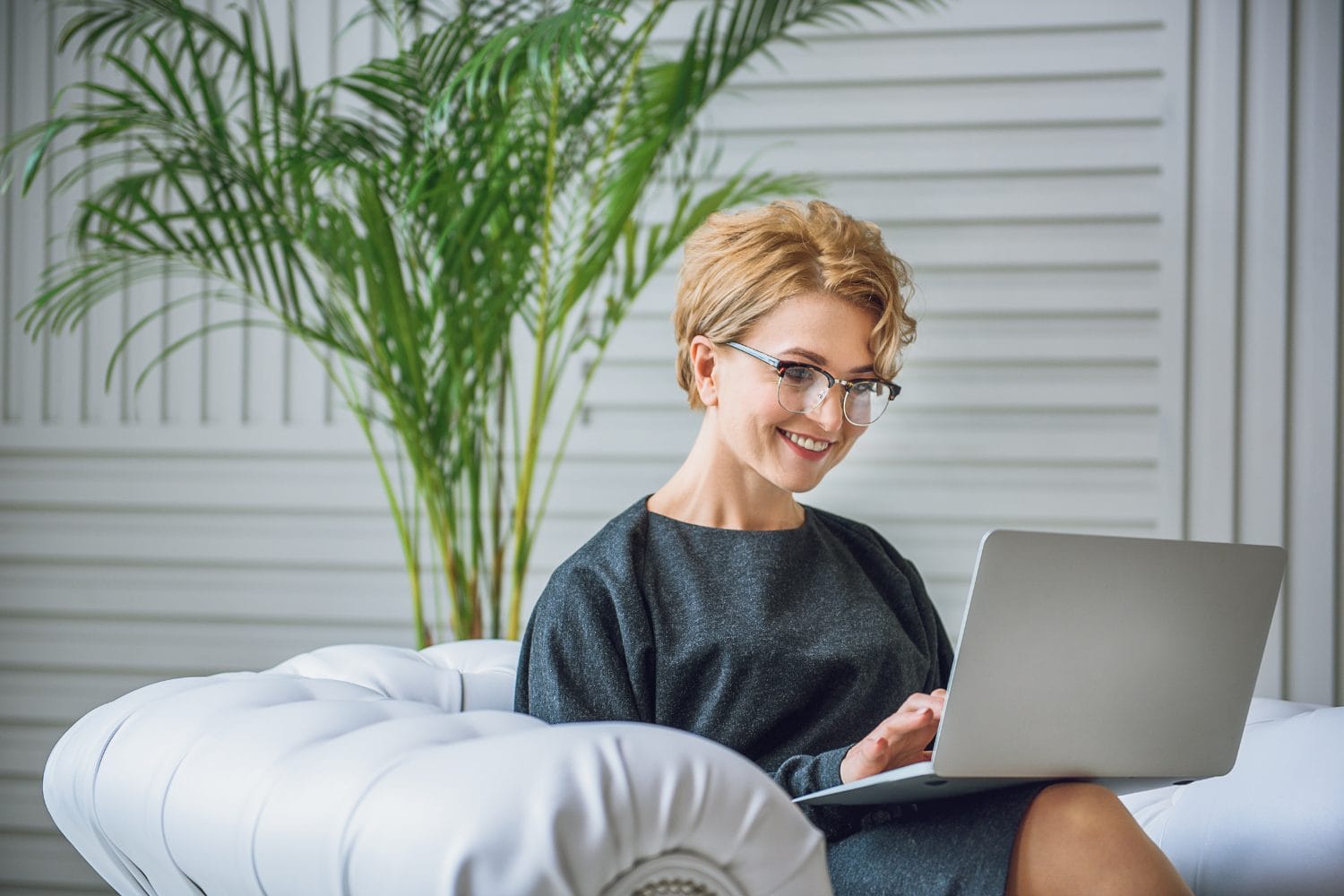 Woman typing on laptop 